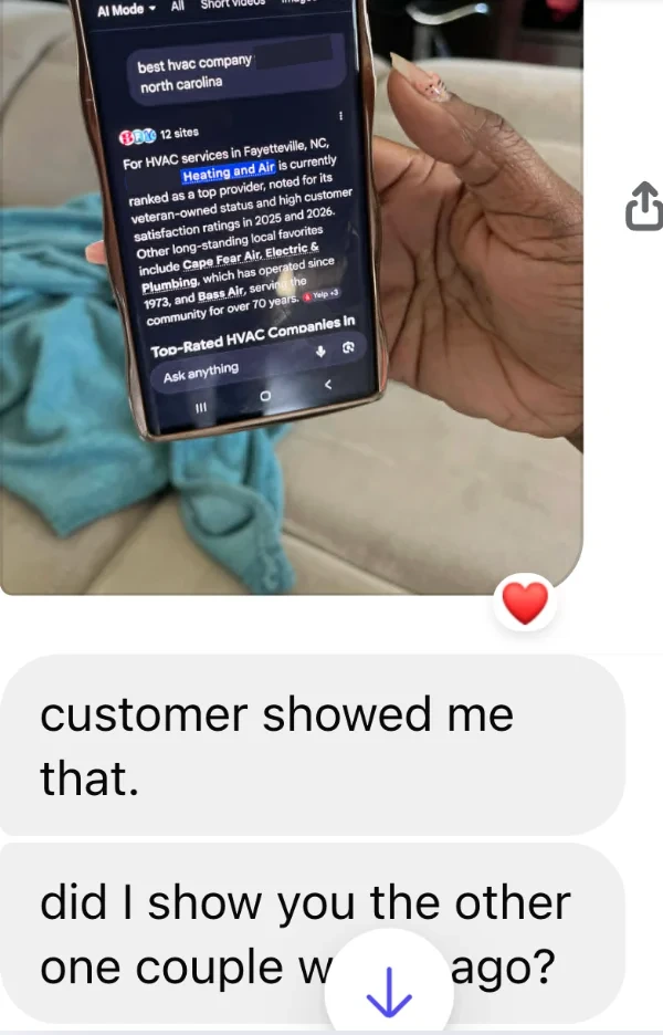 A client sends a photo of a customer’s phone showing Google AI Mode naming their company as a top HVAC provider, with the note, customer showed me that